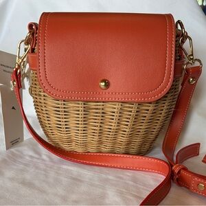 Tommy Bahama Coral-Orange Leather Trim Woven Crossbody